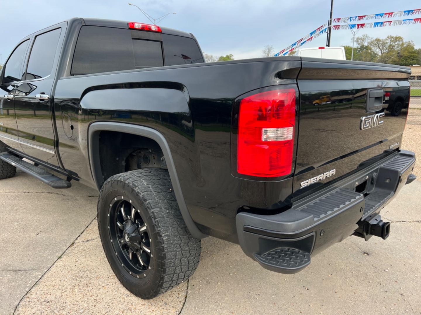 2015 Black /Tan GMC Sierra 2500HD Denali (1GT120E88FF) with an 6.6L Duramax Diesel engine, Allison Transmission transmission, located at 4520 Airline Hwy, Baton Rouge, LA, 70805, (225) 357-1497, 30.509325, -91.145432 - 2015 GMC Sierra 2500HD Crew Cab Denali 4WD 6.6 Duramax Diesel (Deleted), Allison Transmission, 211K Miles, Heated & Cooled Leather Seats, All Power, Backup Camera, Tow Pkg. NO IN HOUSE FINANCING. FOR INFO PLEASE CONTACT JEFF AT 225 357-1497 CHECK OUT OUR A+ RATING WITH THE BETTER BUSINESS BUREAU - Photo#7